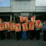 Court delays sentencing women in airport protest for fourth time