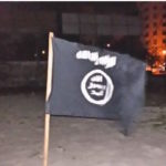Man arrested for raising Islamic State flag
