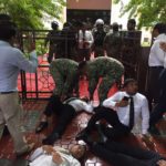 Opposition MPs forced out after soldiers and police storm parliament