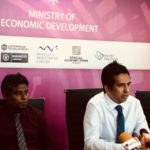Minister defends capping rates for port workers